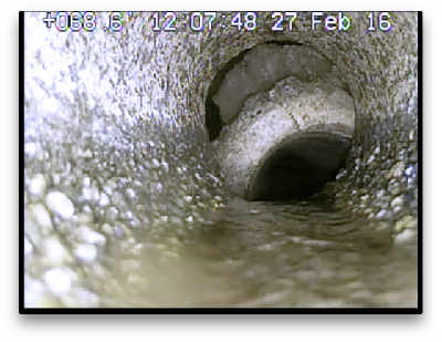 sewer scope inspection camera reveals a break in the side sewer